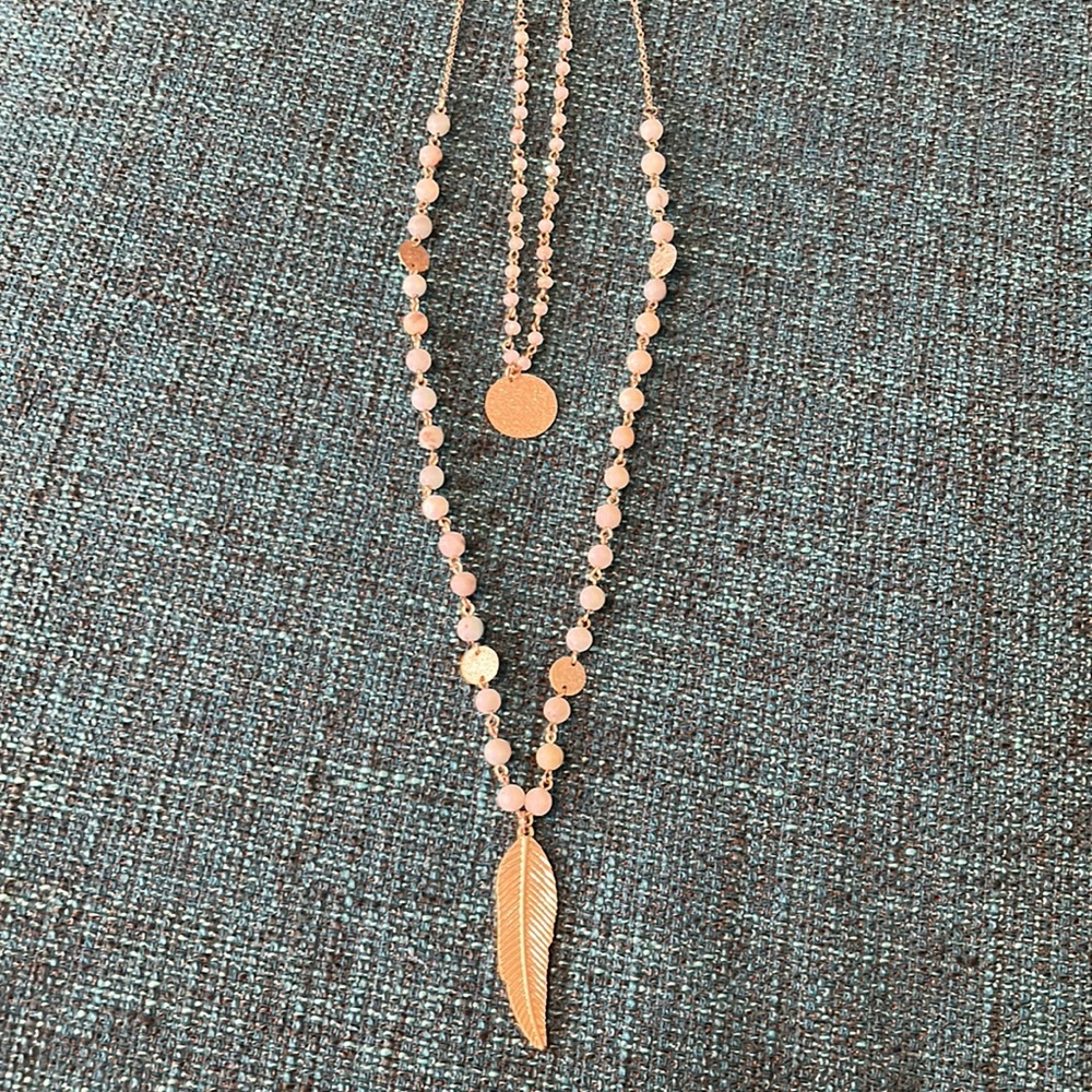 Adjustable to strand beaded necklace with leaf and dome. Adjustable 19-16 inches
